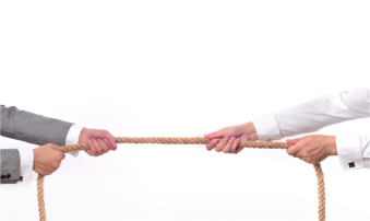 businessmen tug of war conflict