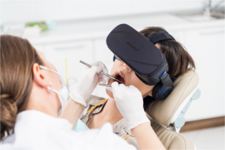 dental exam patient is wearing vr headset 