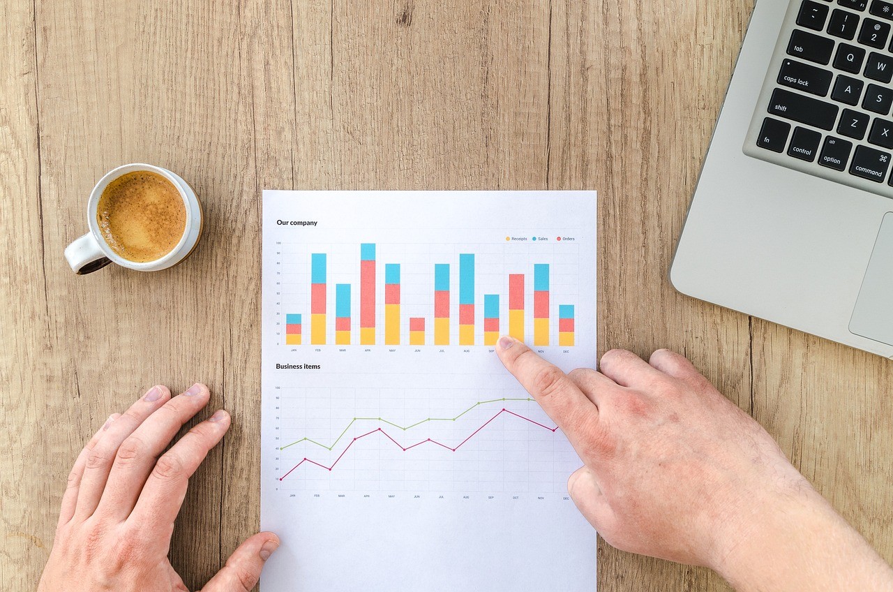person reviewing graphs 