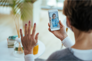patient video chatting dentist