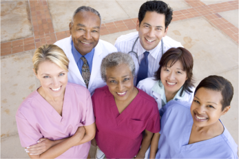 dental staff and dentists smiling 